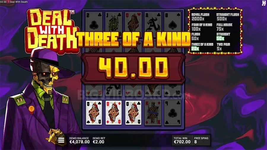 Baccarat table with cards dealt for player and banker.